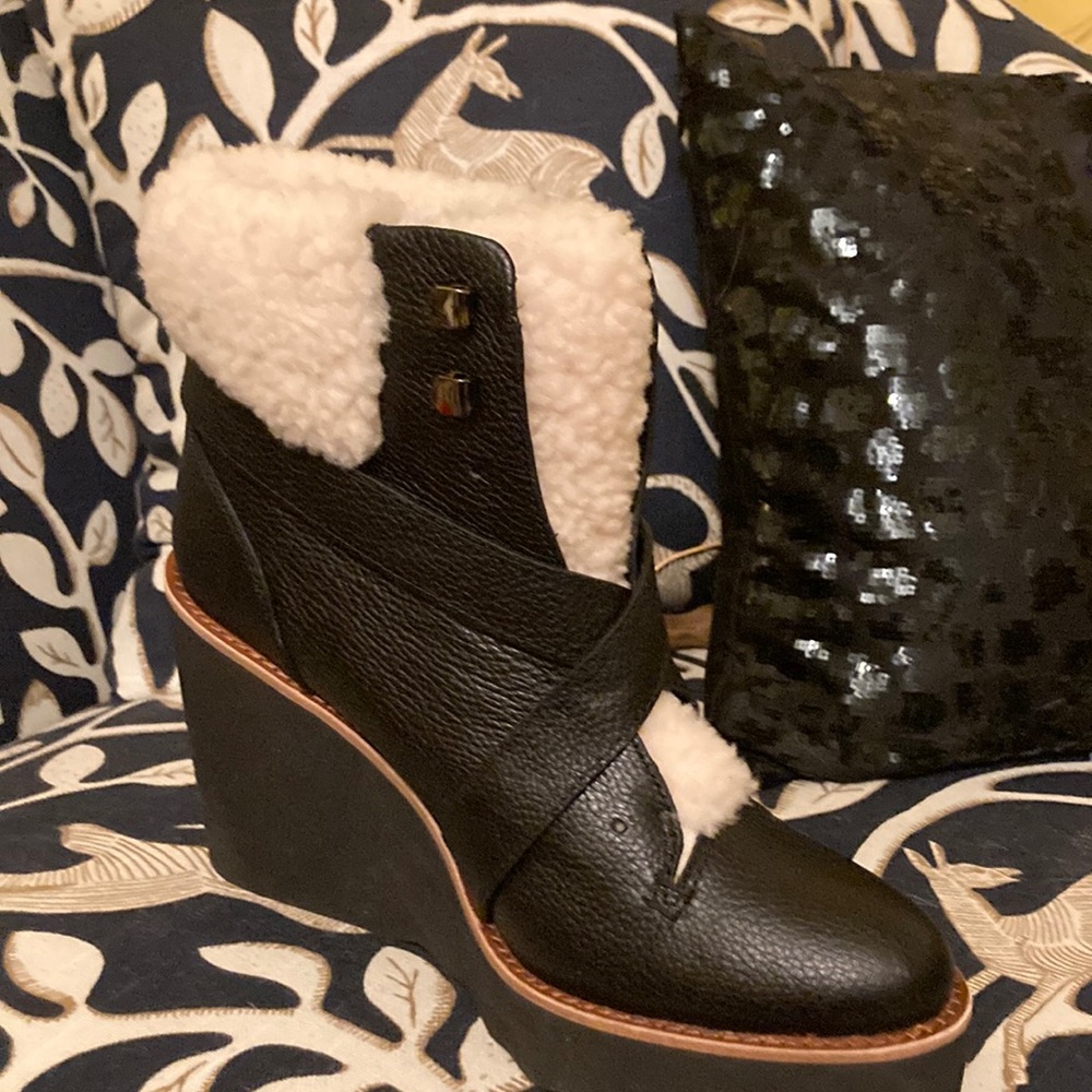 Black leather Coach wedge boots with shearling interior Worn a few hours